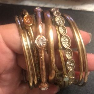 Set of 10 gold tone mixed bracelets